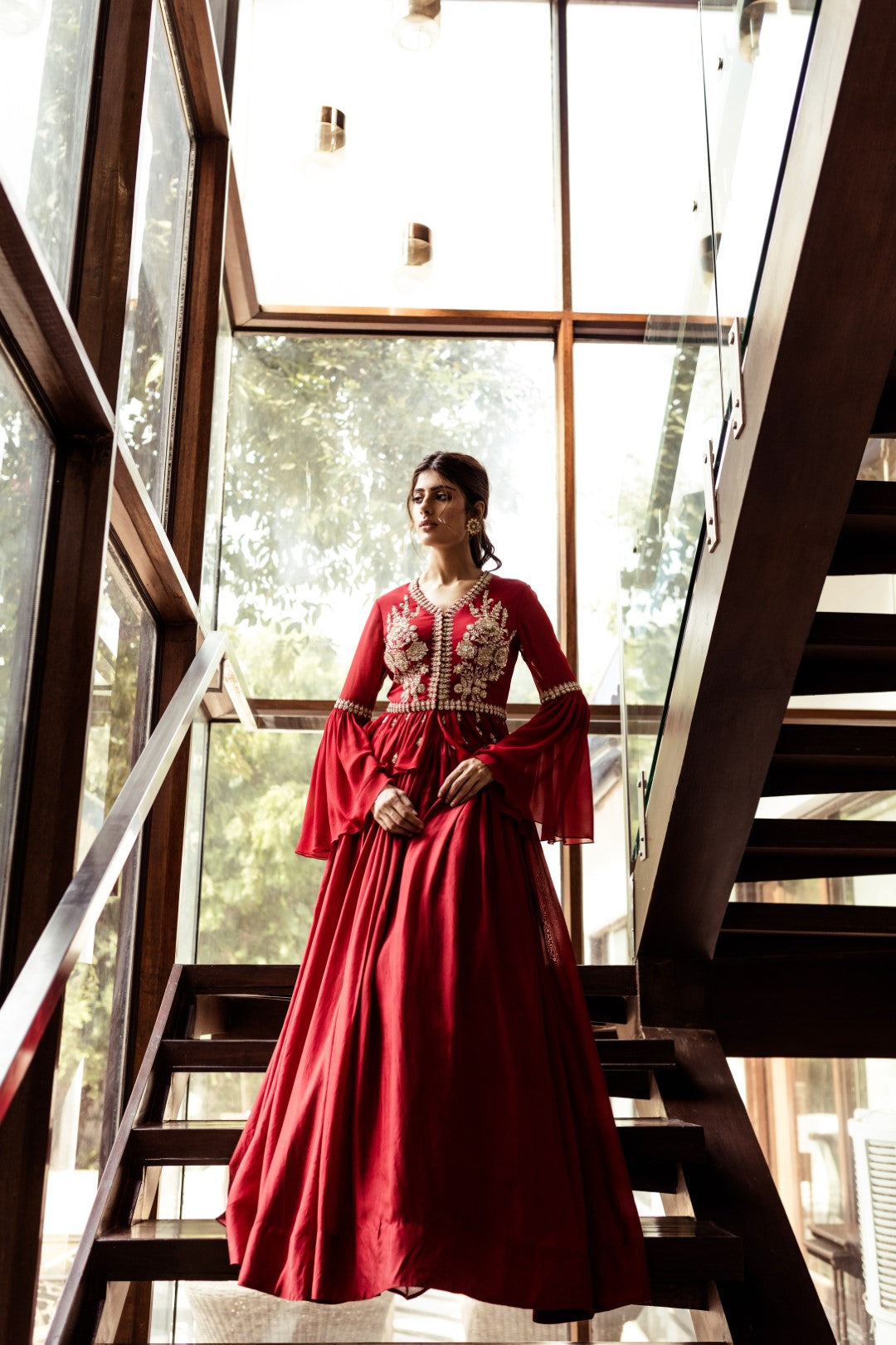 Red Embellished peplum top with flared sleeves and pleated skirt set - BHUMIKA SHARMA