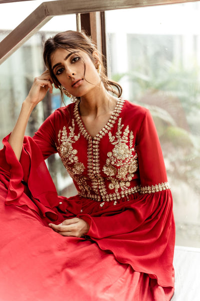 Red Embellished peplum top with flared sleeves and pleated skirt set - BHUMIKA SHARMA