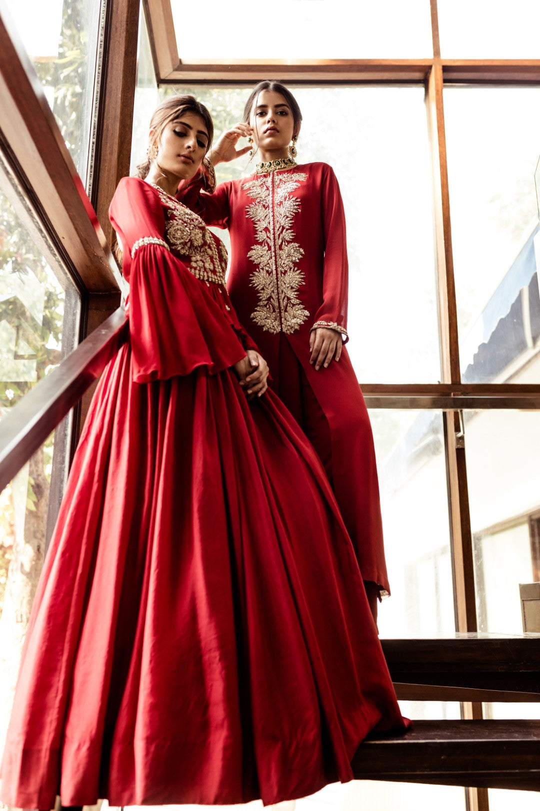 Red Embellished peplum top with flared sleeves and pleated skirt set - BHUMIKA SHARMA